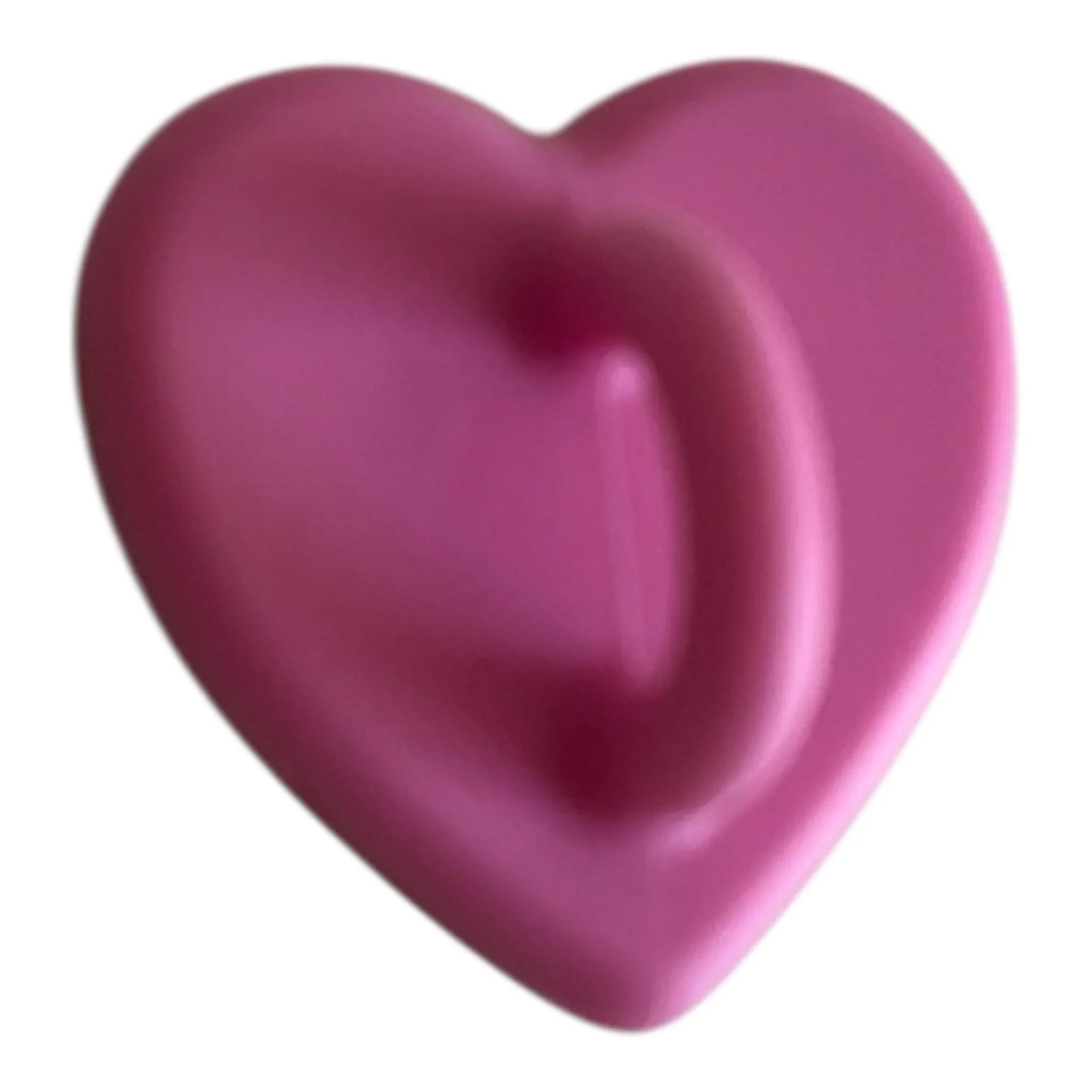 Pink heart-shaped object with smooth, glossy finish on white background