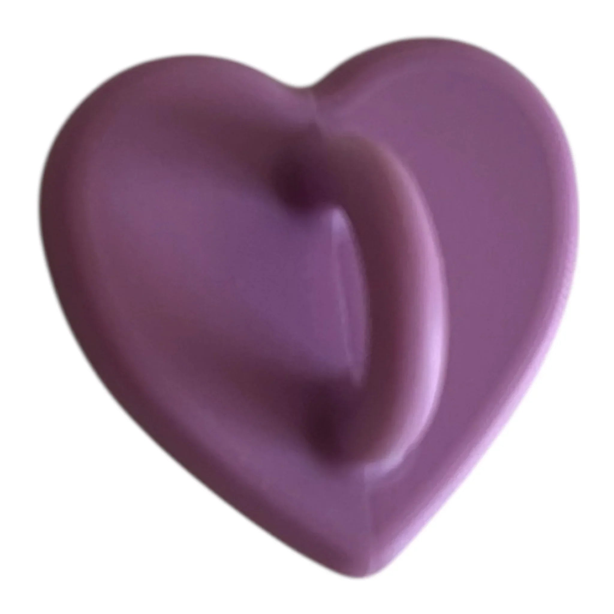 Purple heart-shaped bath bomb with smooth texture, ideal for relaxing self-care routines