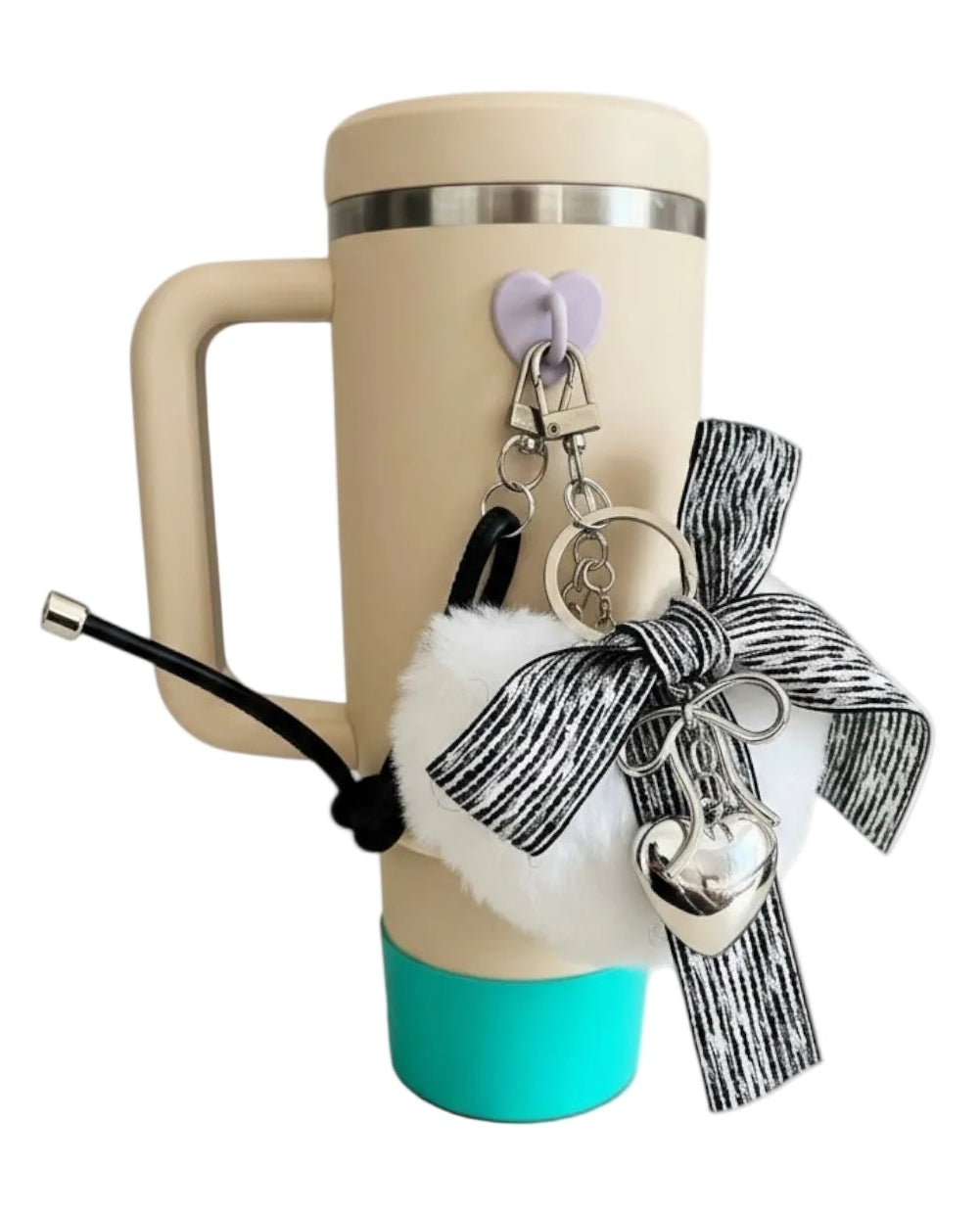 Beige mug with turquoise base and decorative charms on a white background
