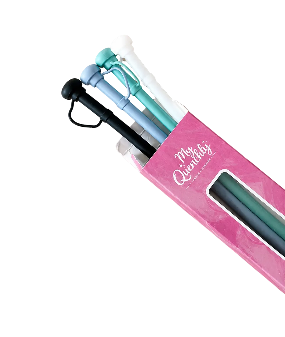 Set of straws  with a pink case on a beige background
