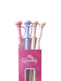 Pastel silicone straws set displayed in a box featuring pink, lavender, and cream colors.